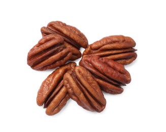 Many tasty pecan nuts isolated on white