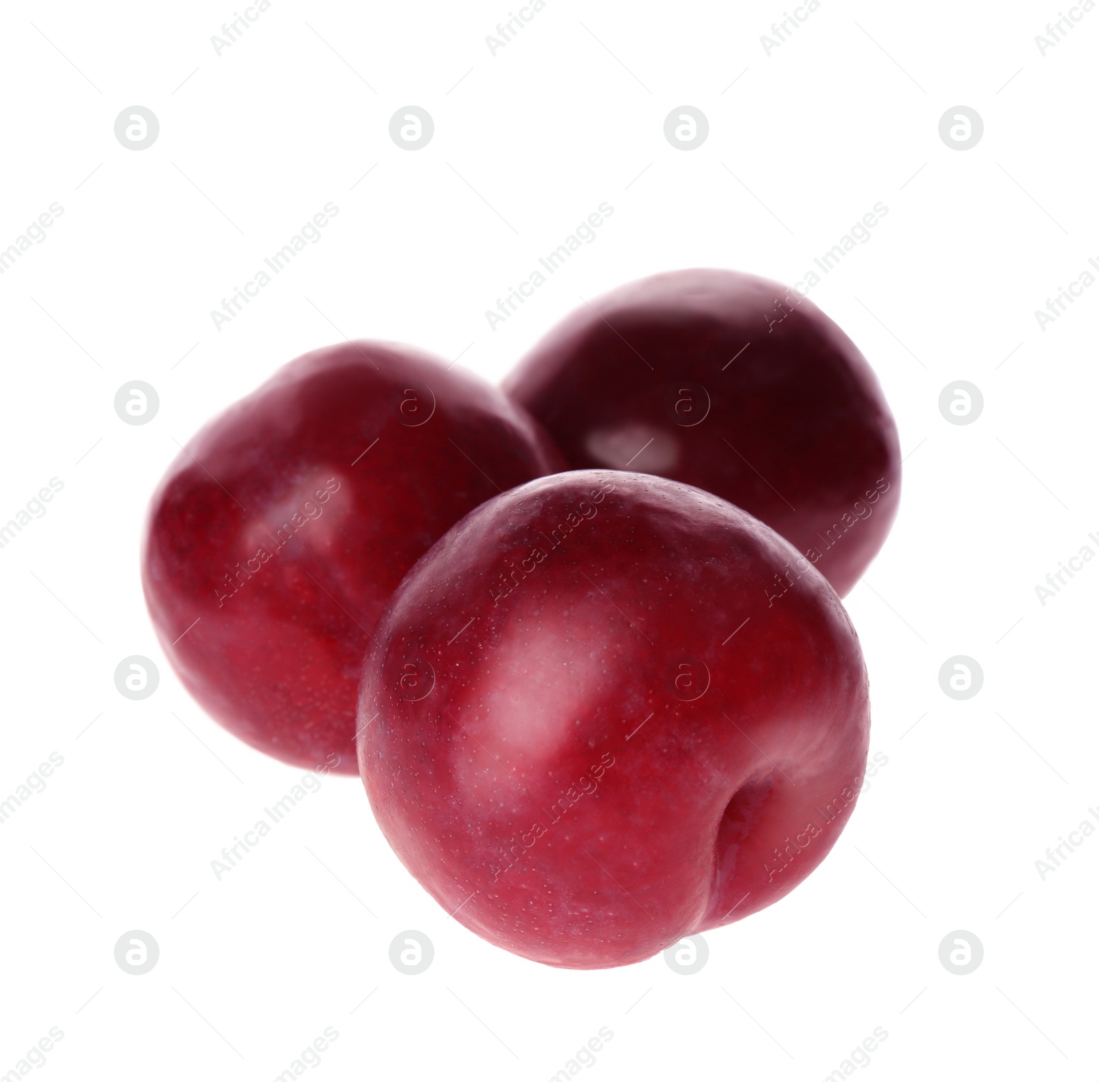 Photo of Delicious fresh ripe plums isolated on white