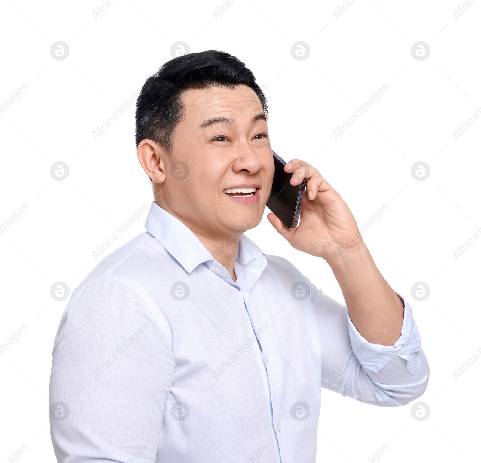 Photo of Businessman in formal clothes talking on phone against white background