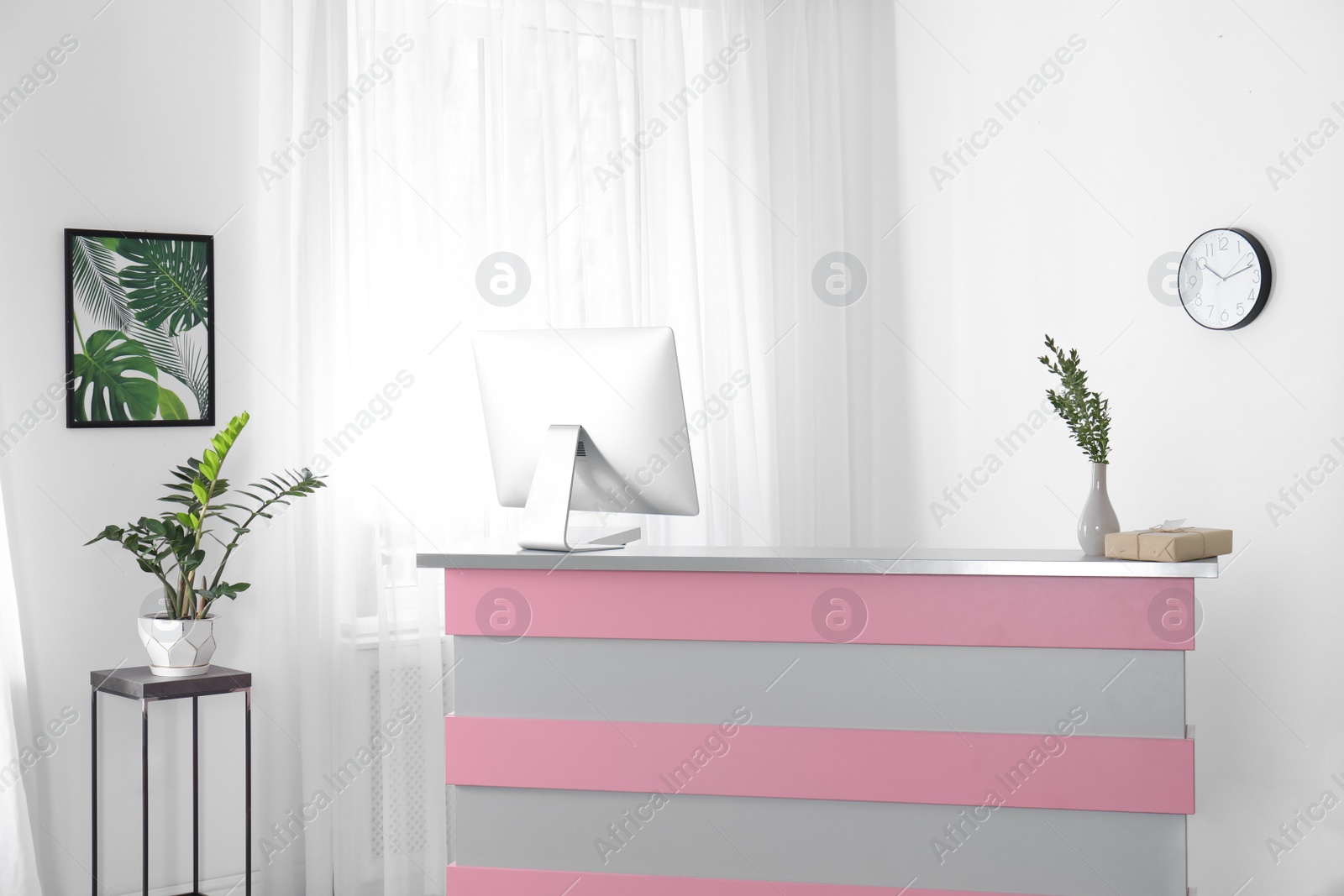 Photo of Modern reception desk in beauty salon. Stylish interior