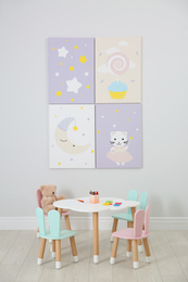 Little table and chairs with bunny ears in children's room. Interior design