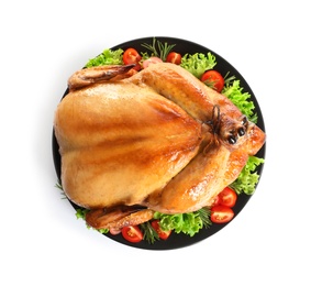 Photo of Platter of cooked turkey with garnish on white background, top view