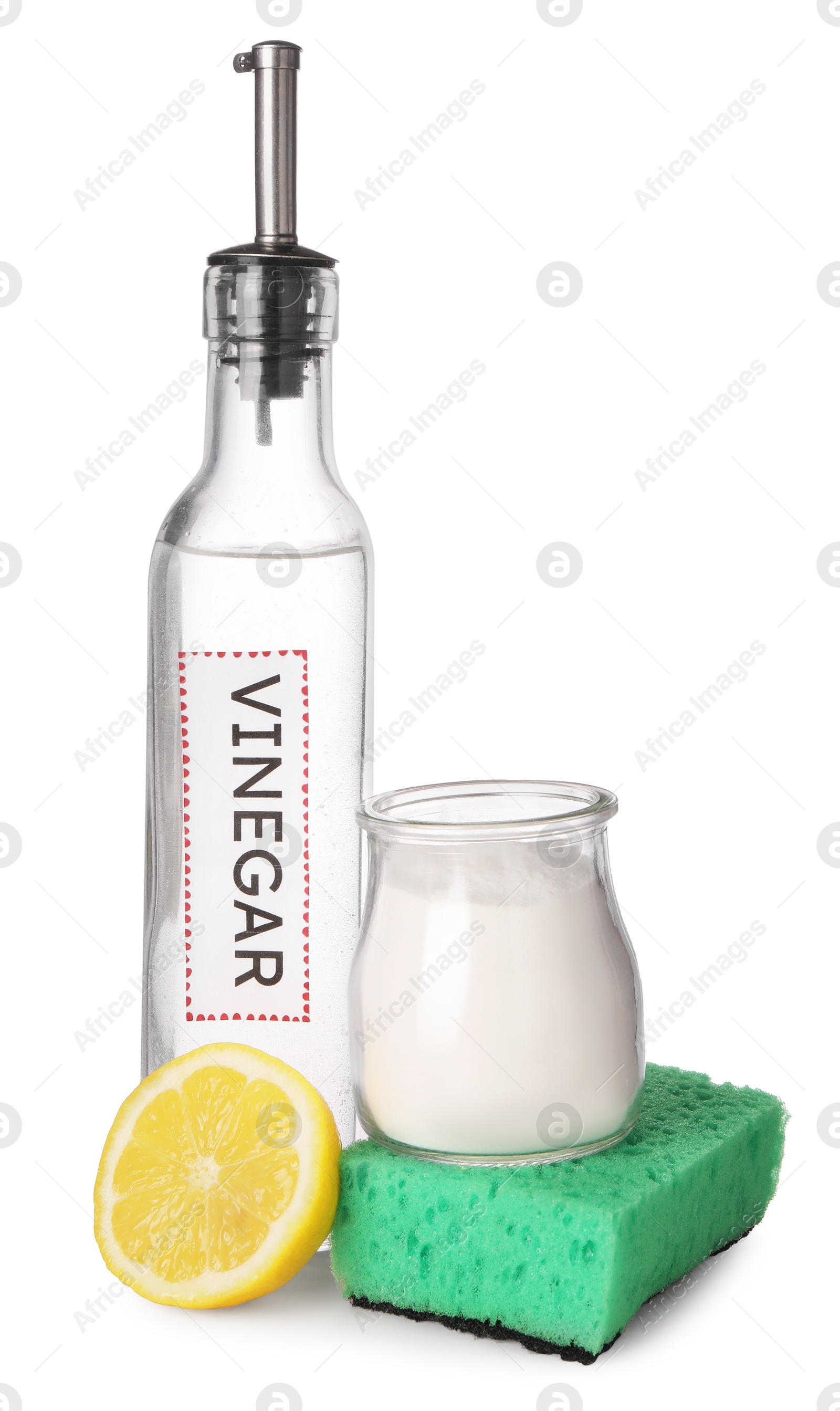 Photo of Eco friendly natural cleaners. Vinegar in bottle, cut lemon, sponge and jar of soda isolated on white