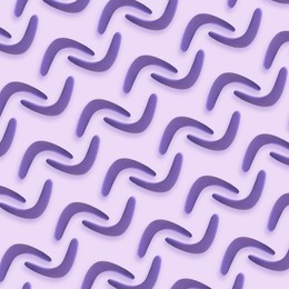 Image of Violet boomerangs on light background, flat lay