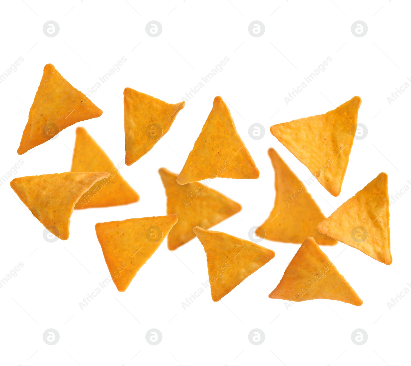 Image of Tasty tortilla chips (nachos) falling on white background