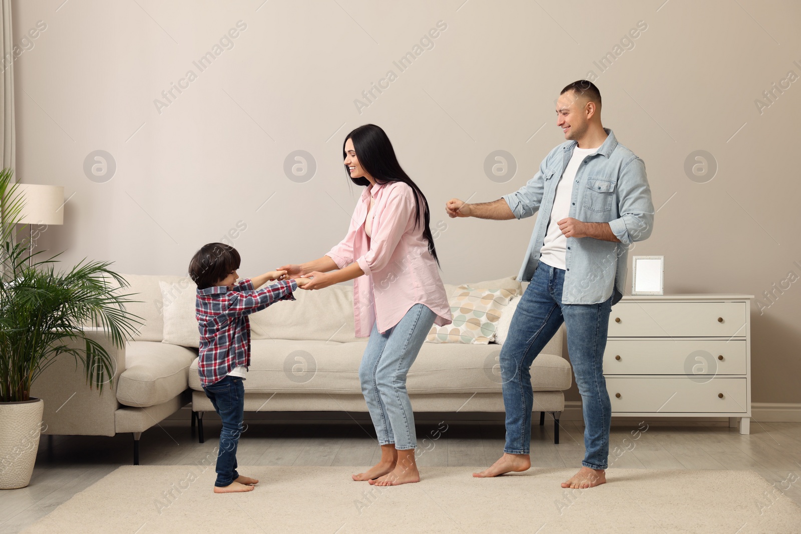 Photo of Happy family spending time together at home