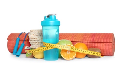 Photo of Healthy food, measuring tape and sport equipment on white background. Concept of weight loss