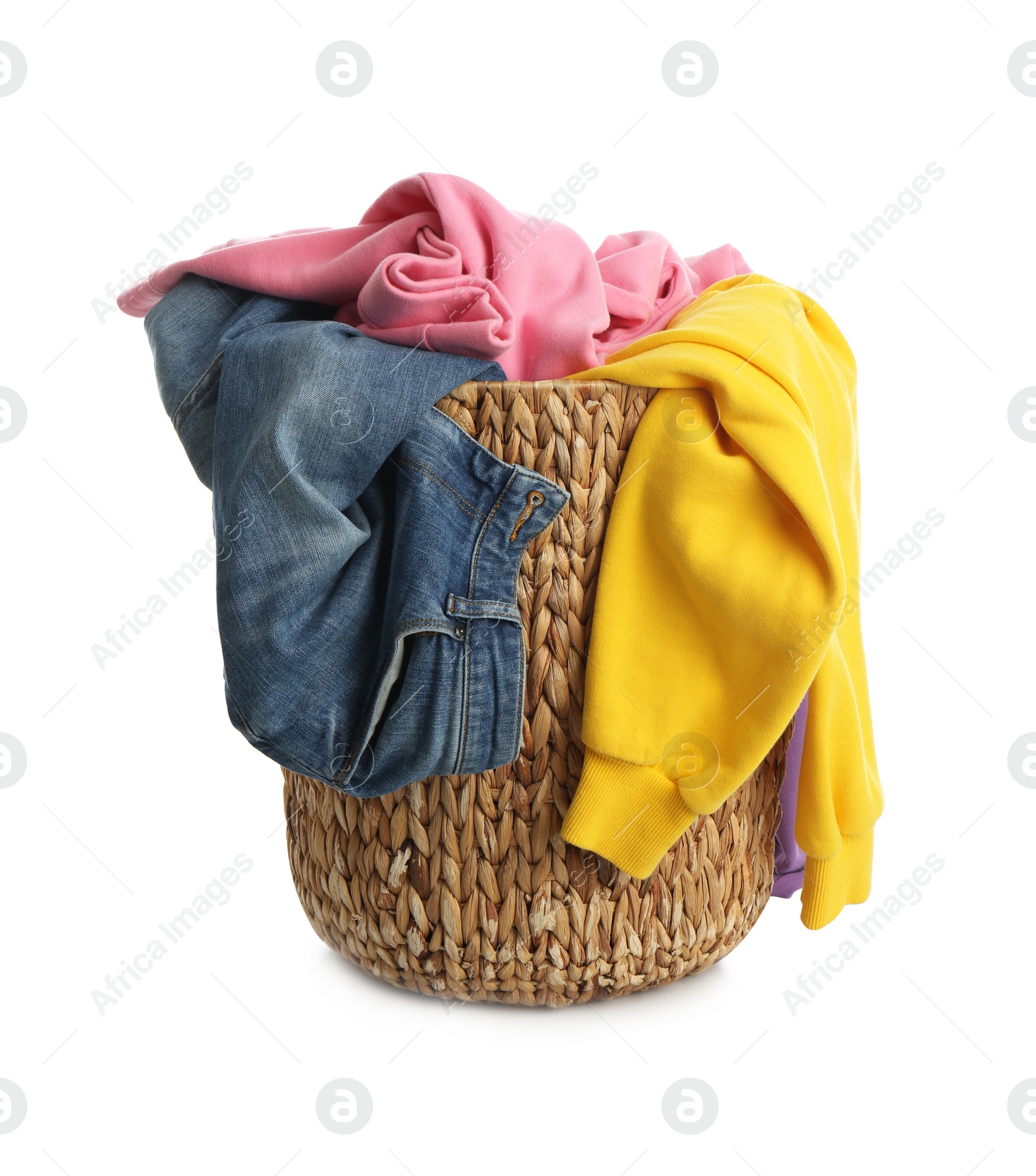 Photo of Wicker laundry basket with different clothes isolated on white