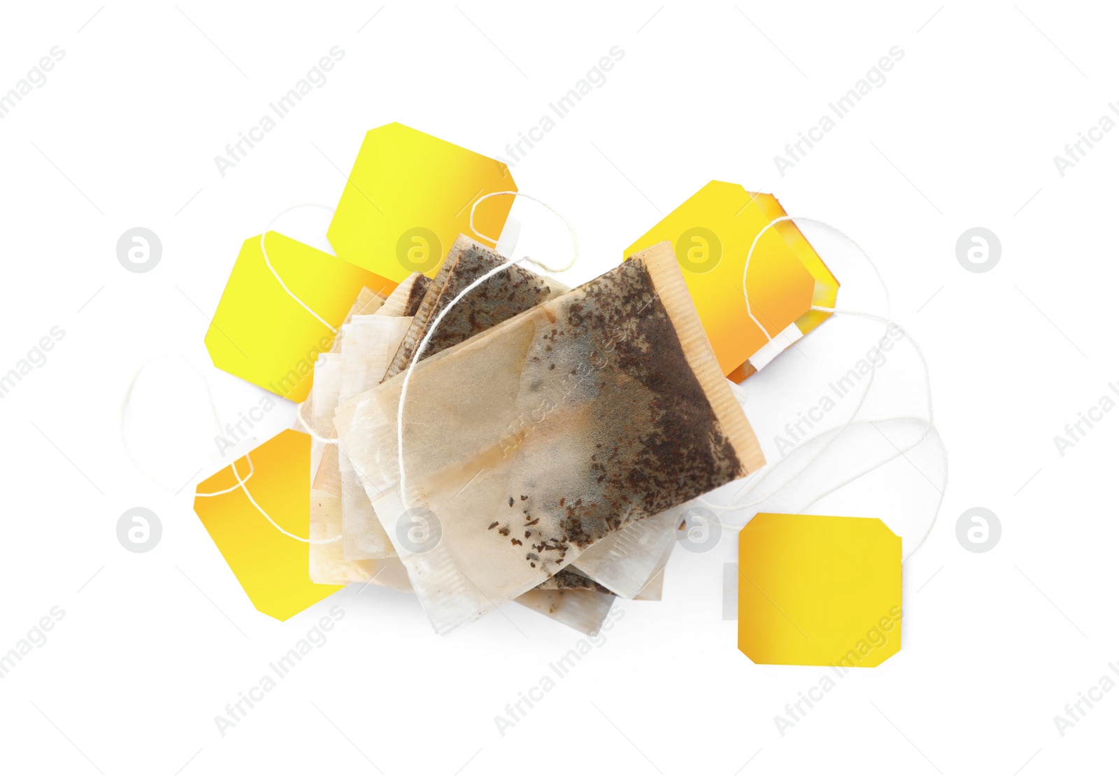 Photo of Used tea bags on white background, top view