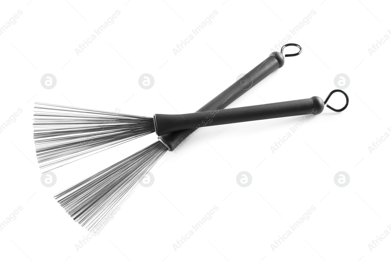 Photo of Drum brushes on white background. Musical instrument