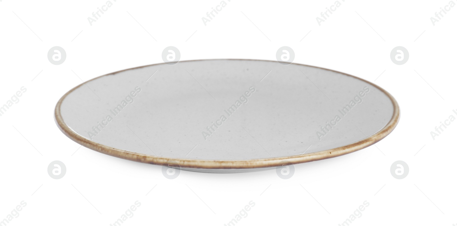 Photo of Clean empty ceramic plate isolated on white