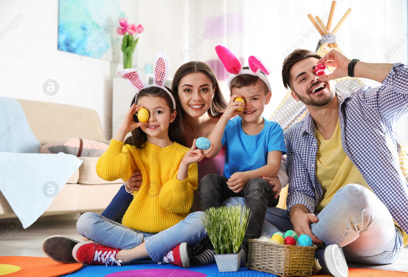 Photo of Happy family spending time together during Easter holiday at home