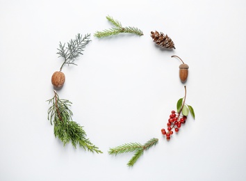 Flat lay composition with Christmas tree branches on white background. Space for text