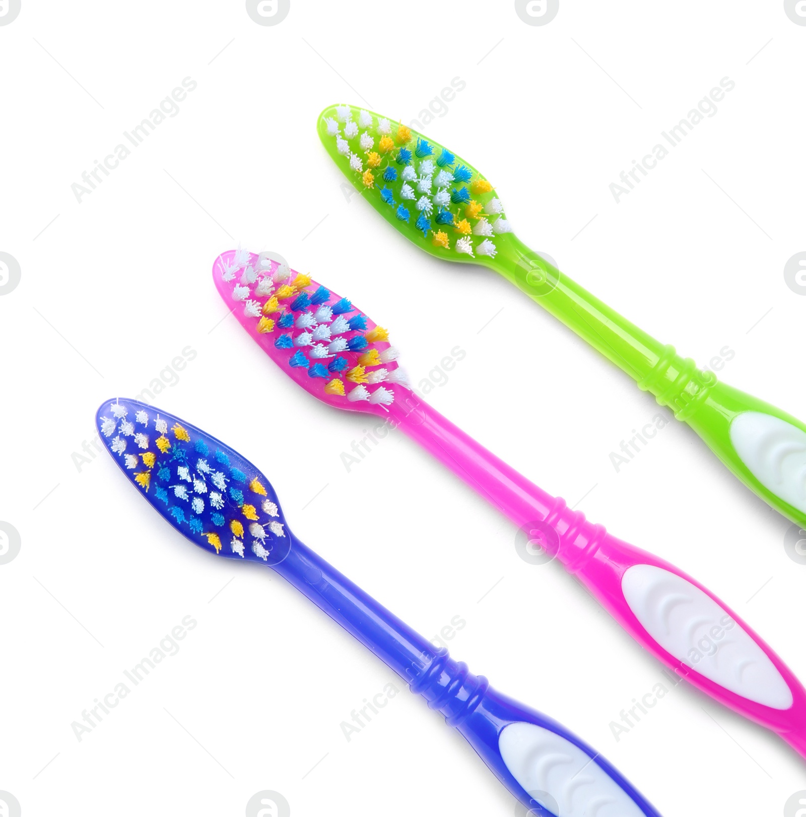 Photo of Color toothbrushes on white background. Dental care