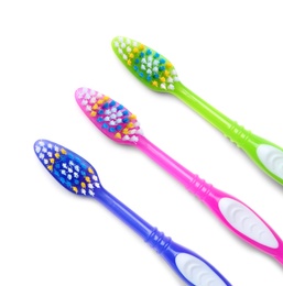 Photo of Color toothbrushes on white background. Dental care