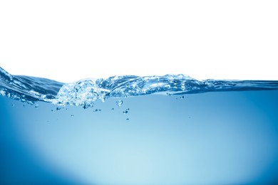Photo of Splash of clear blue water on white background