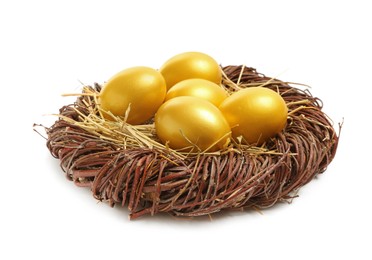 Shiny golden eggs in nest on white background