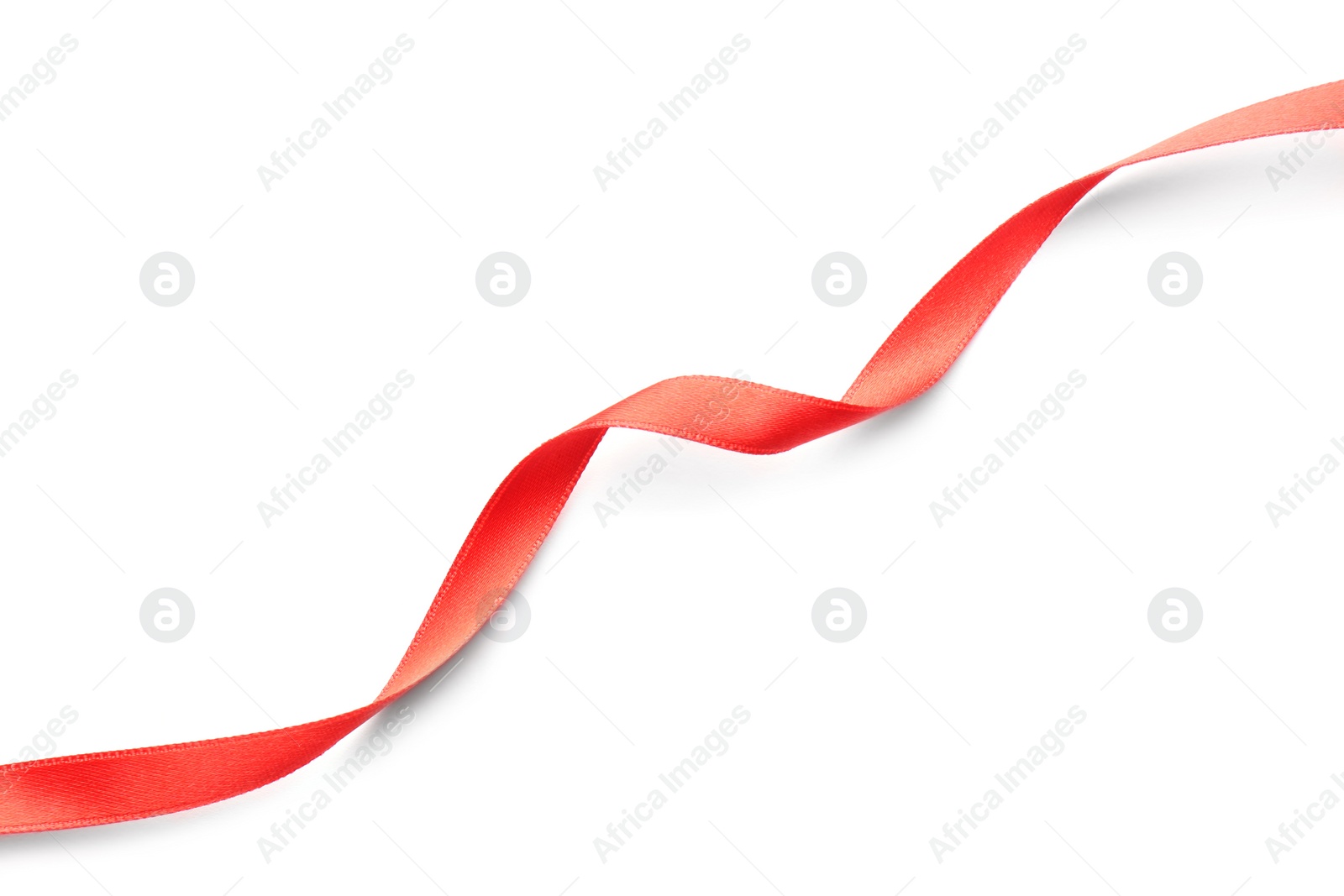 Photo of Simple red ribbon on white background, top view. Festive decoration