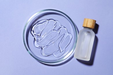 Photo of Petri dish with sample and bottle on lilac background, flat lay