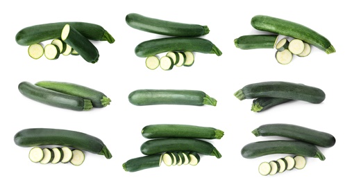 Image of Set of fresh ripe zucchinis on white background