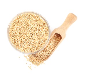 Bowl and wooden scoop with quinoa on white background, top view