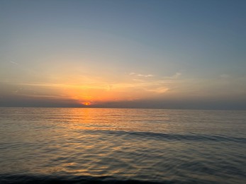 Picturesque view of beautiful sea at sunset