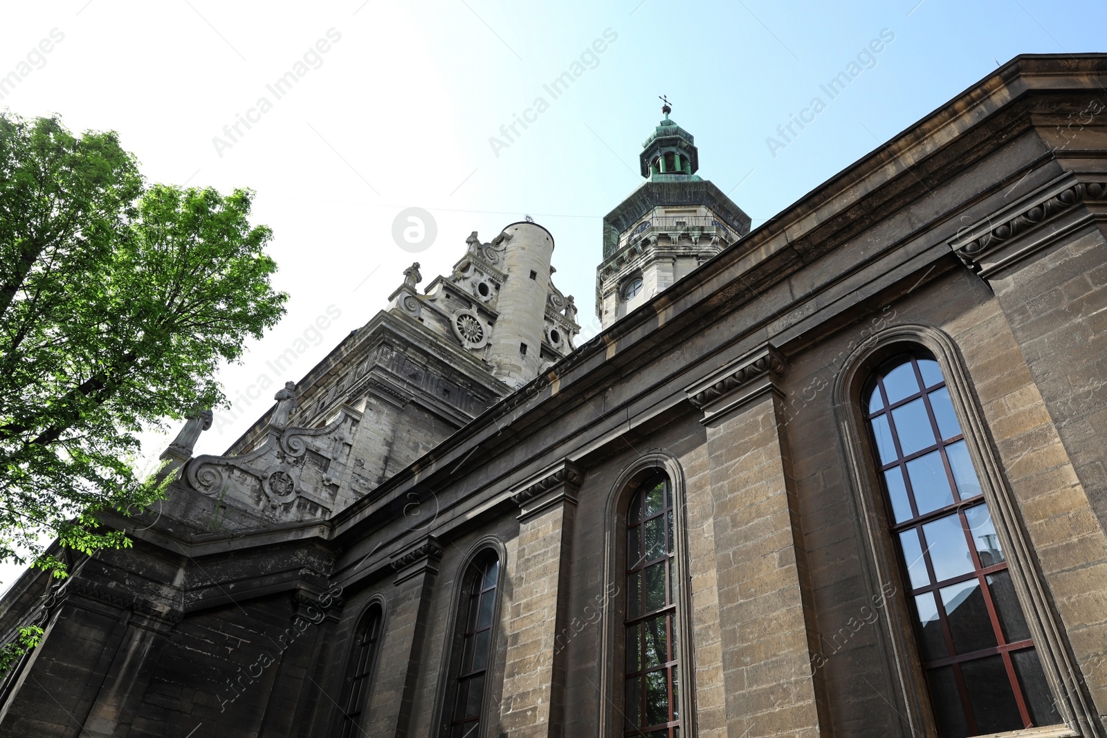 Photo of LVIV, UKRAINE - APRIL 27, 2019: Low angle view of Bernardine church and monastery