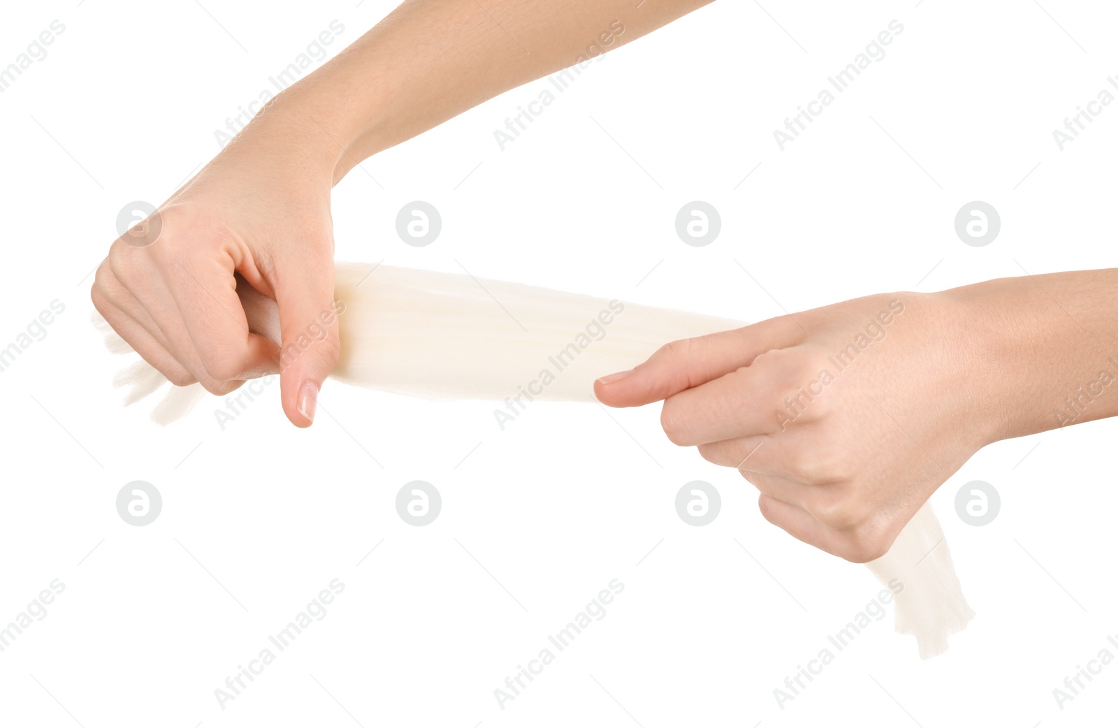 Photo of Woman holding felting wool on white background, closeup