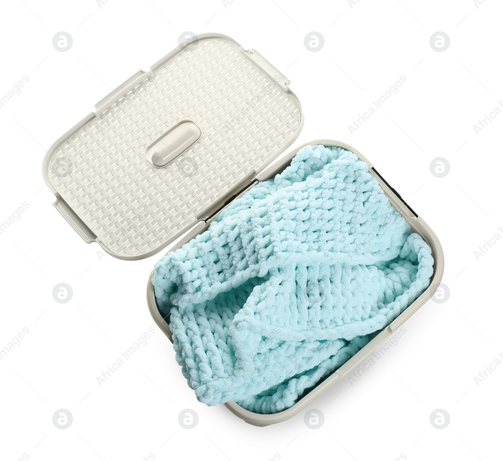 Photo of Plastic laundry basket full of clothes on white background, top view