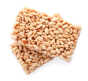 Photo of Delicious rice crispy treats isolated on white, top view