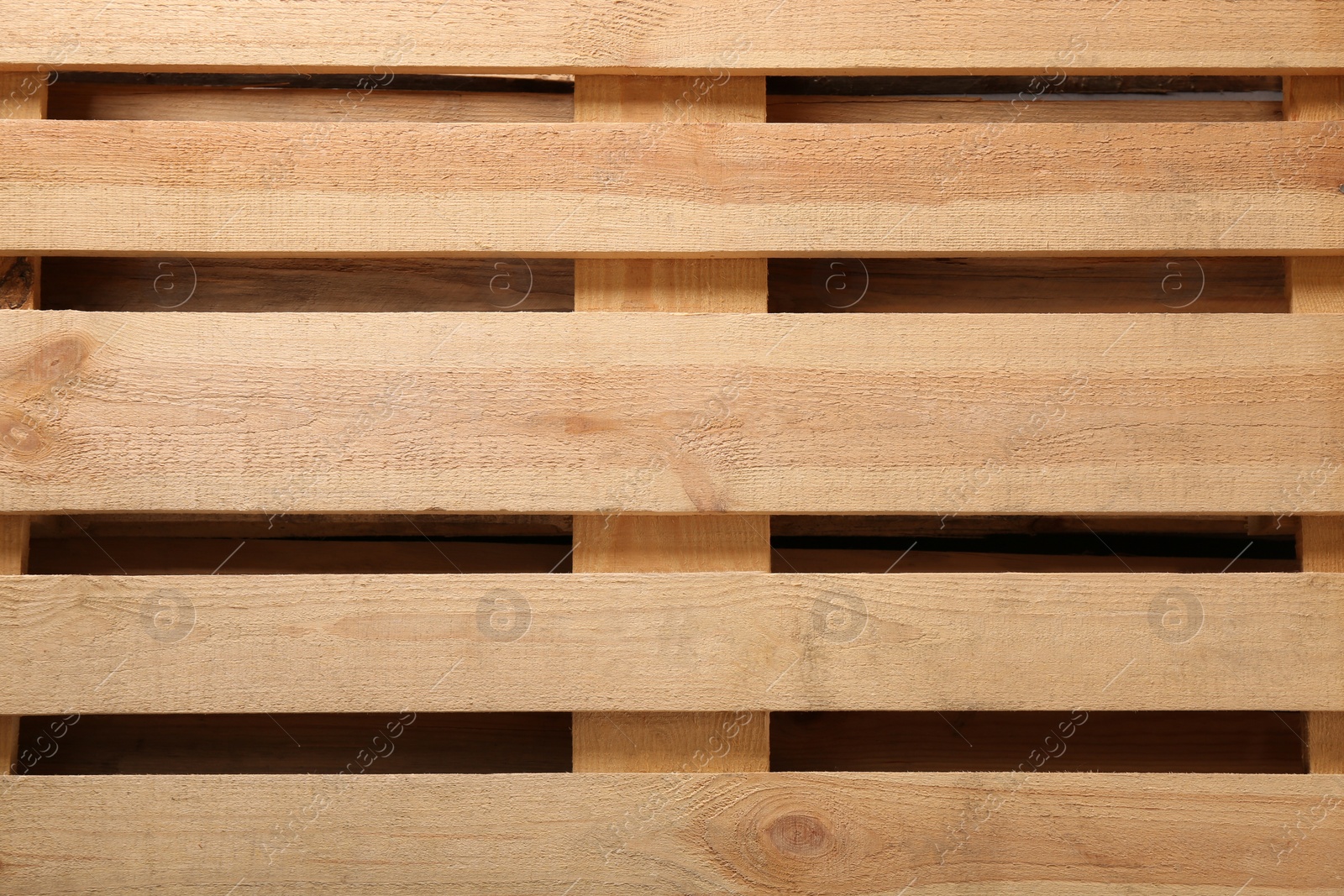 Photo of Wooden pallet as background, top view. Transportation and storage