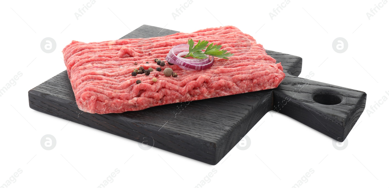 Photo of Board with raw ground meat, onion, peppercorns and parsley isolated on white