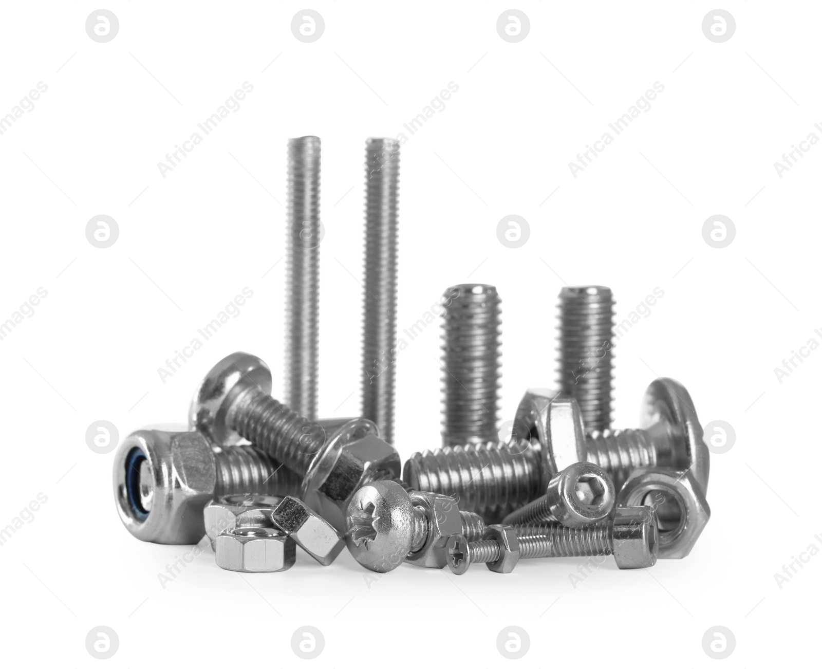 Photo of Different metal bolts and nuts on white background