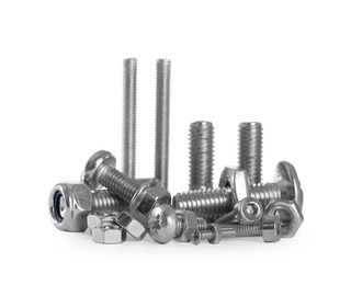 Photo of Different metal bolts and nuts on white background