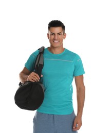 Photo of Handsome man with sports bag on white background