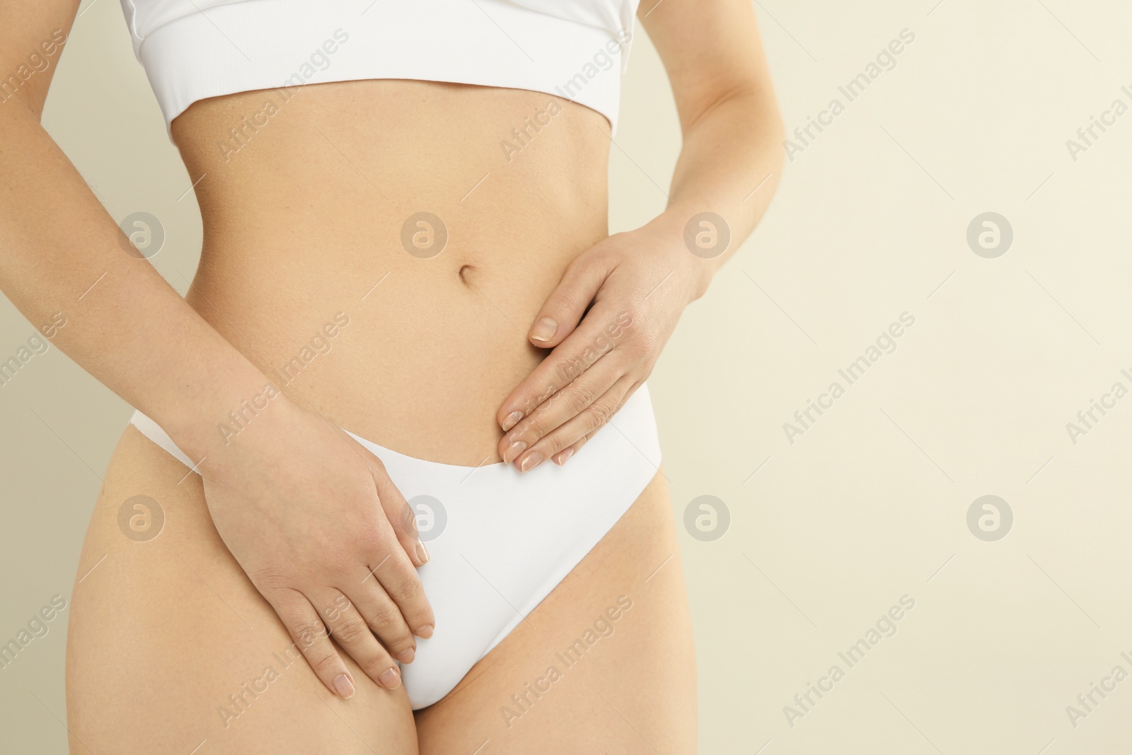 Photo of Gynecology. Woman in underwear on light background, closeup. Space for text