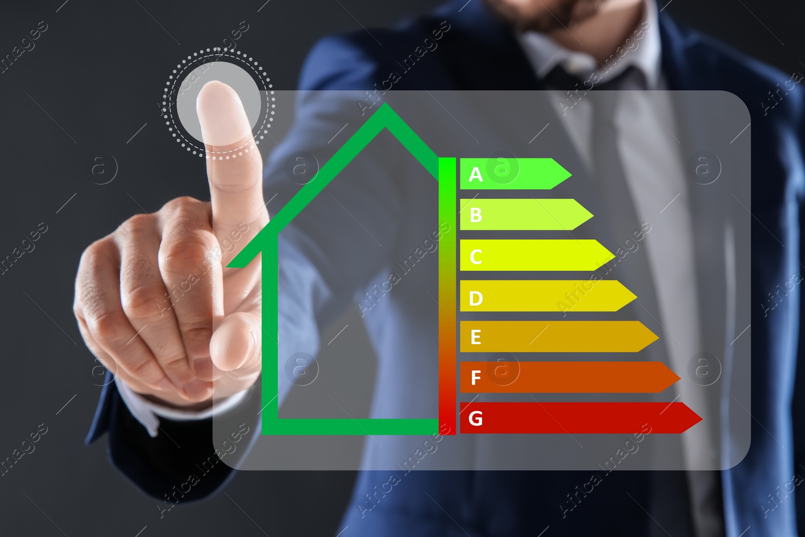 Image of Energy efficiency. Man touching colorful rating on digital screen against grey background, closeup