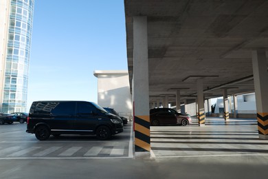 Outdoor parking lot with cars on sunny day