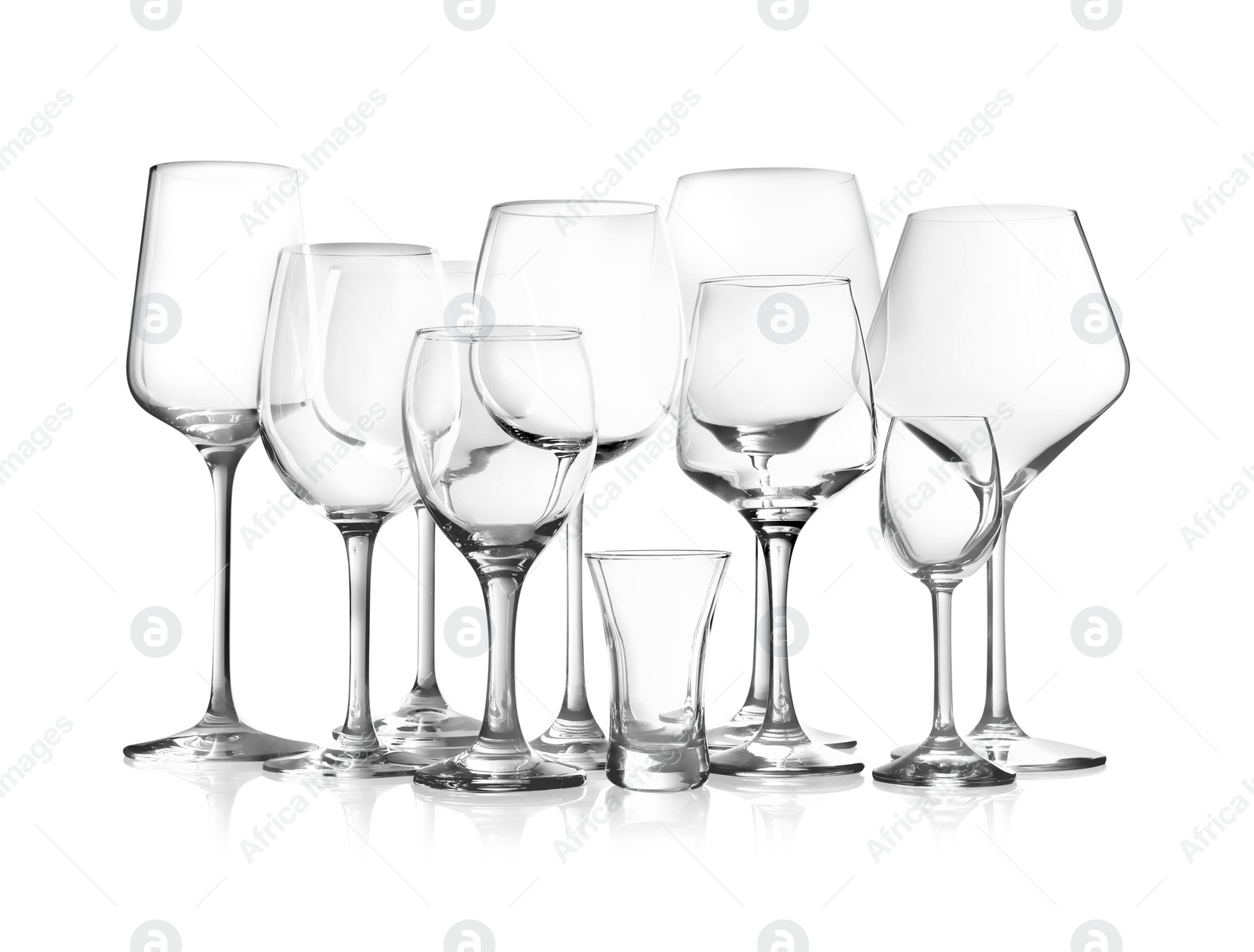 Photo of Set of new bar glassware on white background