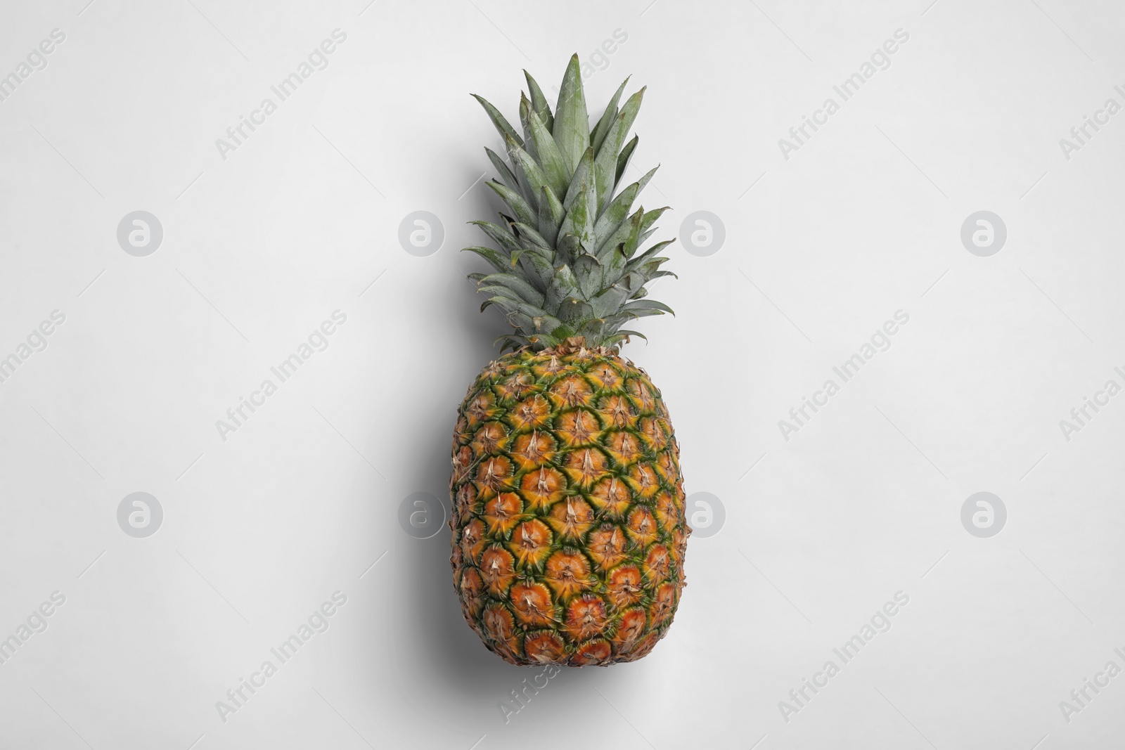 Photo of Tasty fresh raw pineapple on white background, top view