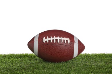 Photo of Leather American football ball on lawn against white background