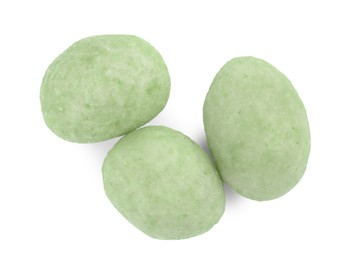 Tasty wasabi coated peanuts on white background