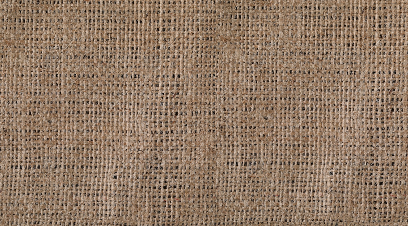 Photo of Brown burlap fabric as background, top view