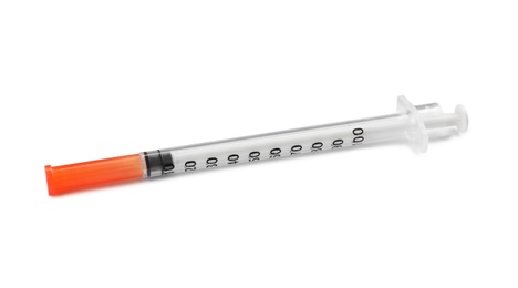 Empty syringe on white background. Medical treatment