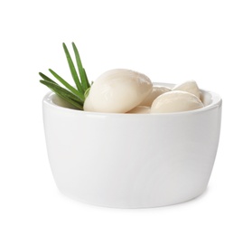 Photo of Bowl with preserved garlic and rosemary on white background