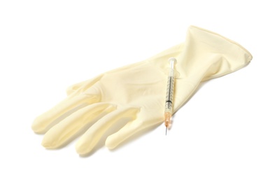 Photo of Medical glove and syringe on white background