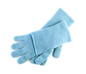 Photo of Stylish blue gloves on white background, top view. Autumn clothes