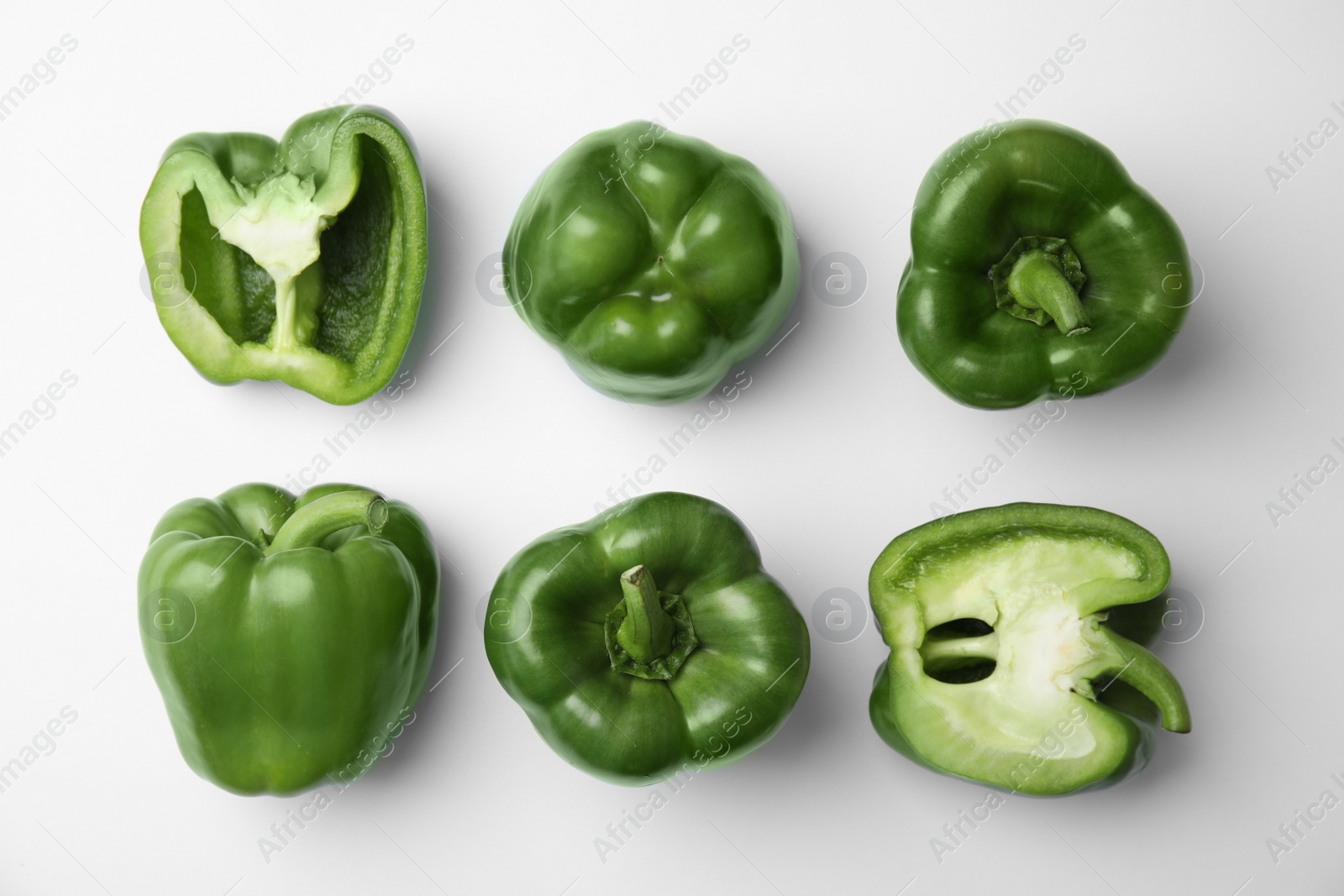 Photo of Flat lay composition with raw ripe paprika peppers on white background