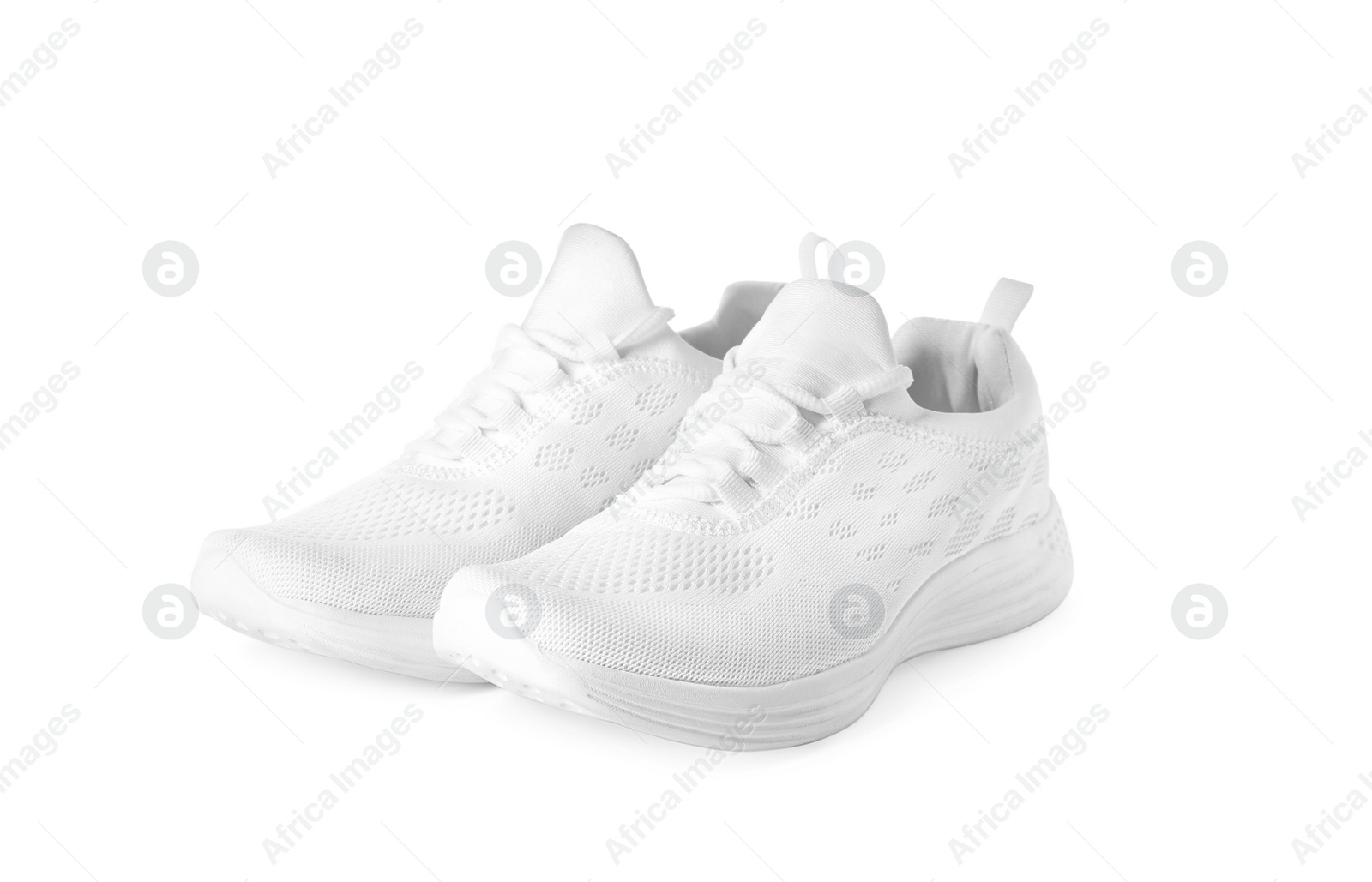 Photo of Stylish sport shoes on white background. Trendy footwear