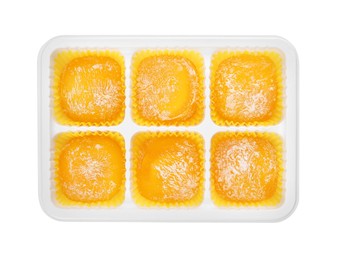 Photo of Plastic tray with delicious mochi on white background, top view. Traditional Japanese dessert